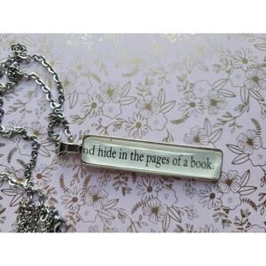 Hide in a Book pendant necklace made with Last Chance Library book pages